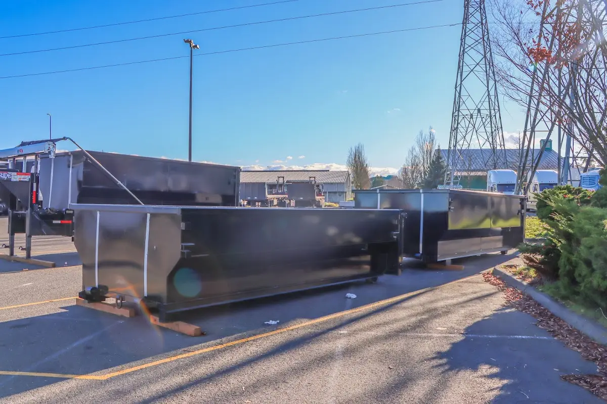 Roll-off dumpster ready for waste disposal at job site for Construction Dumpster Rental in Lake Ridge